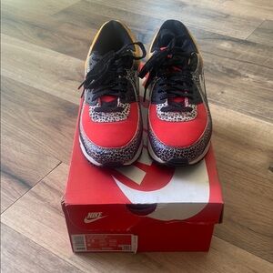 Nike Red and Black Sneakers with Leopard Accents